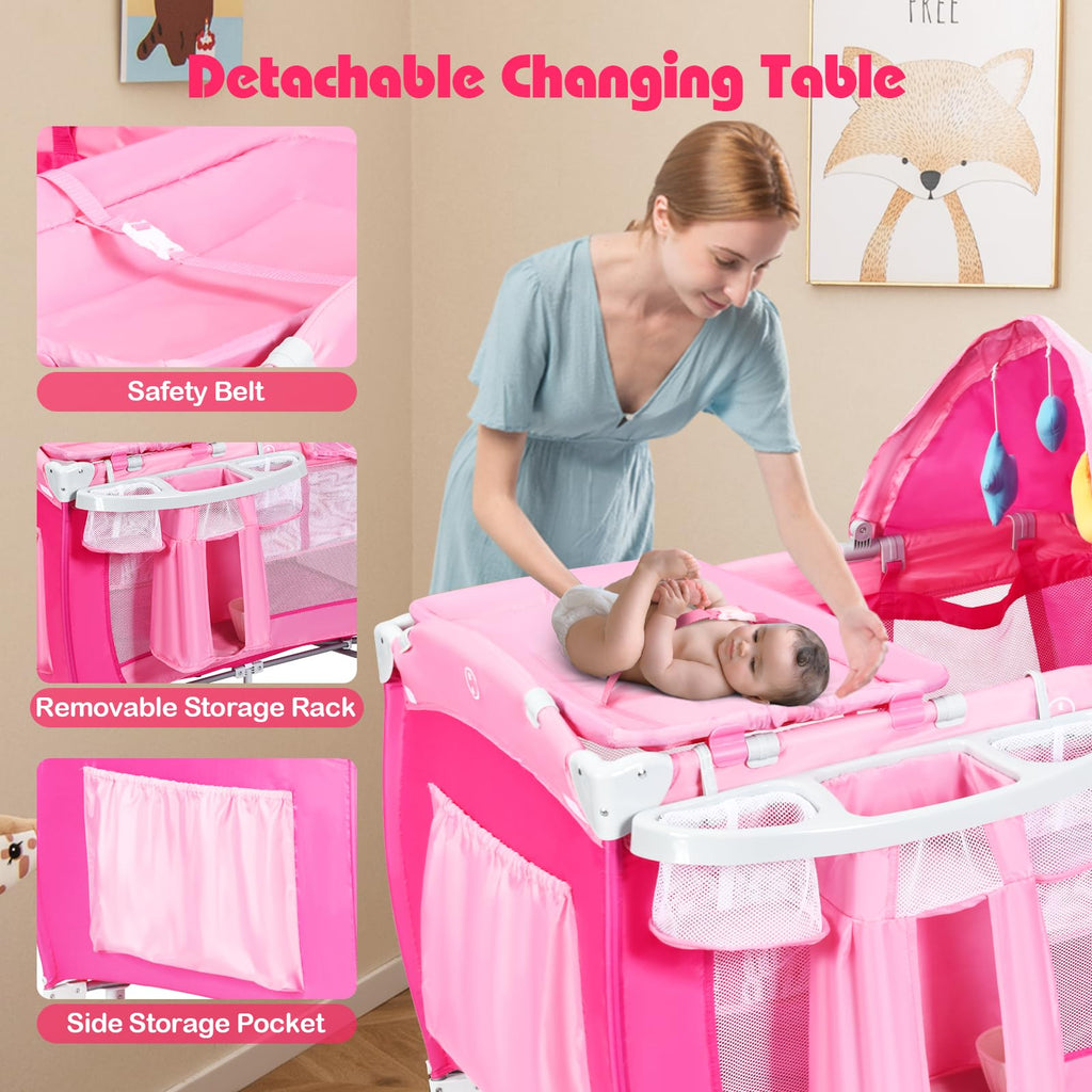 4 in 1 Pack and Play Portable Baby Bassinet Playpen with Diaper Changer Mattress Canopy Storage Rack Toy Bar Music Box Foldable Travel Playard Pink I317311